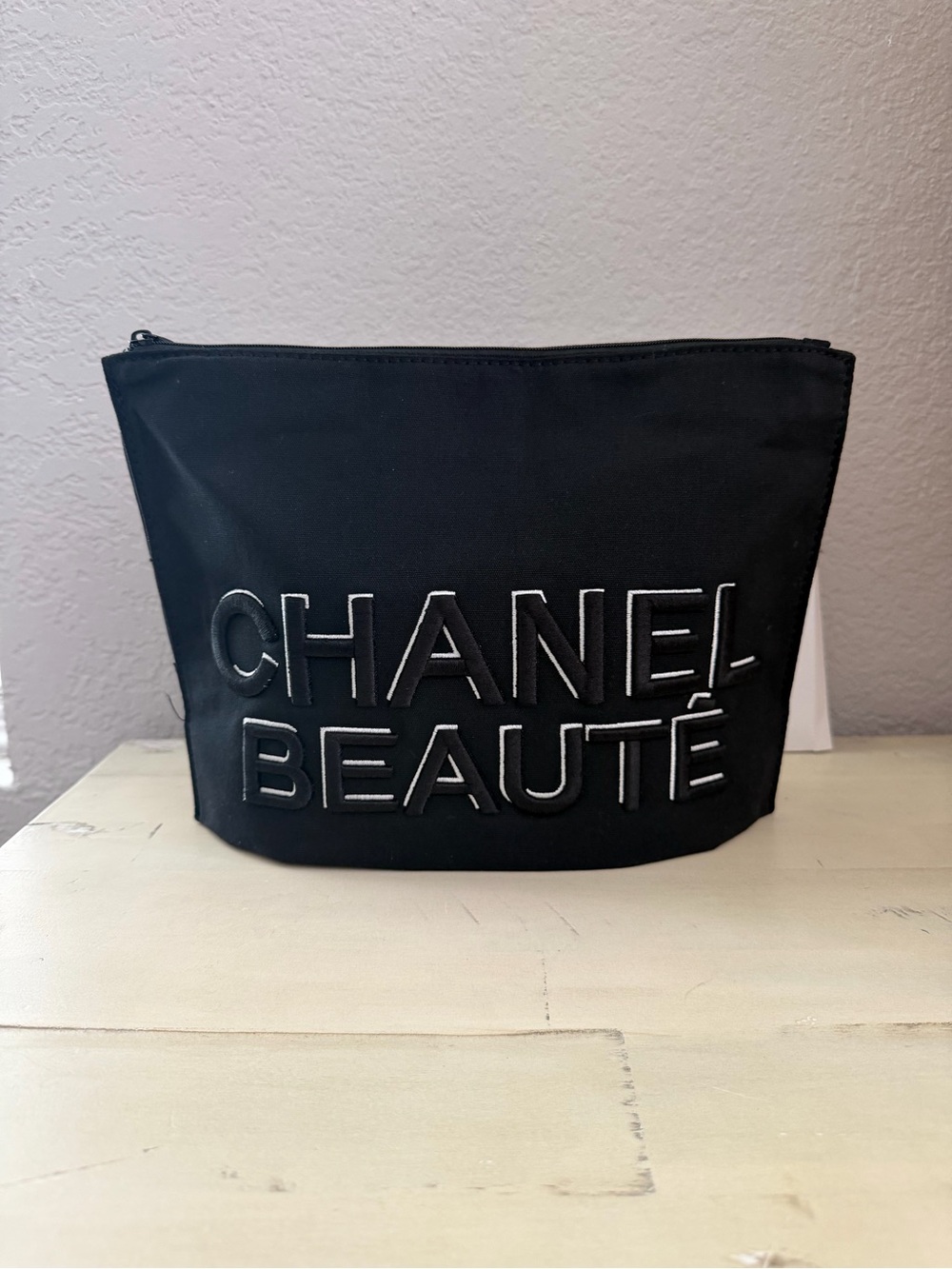 CHANEL Black Embossed 'CHANEL BEAUTÉ' Cosmetic Pouch